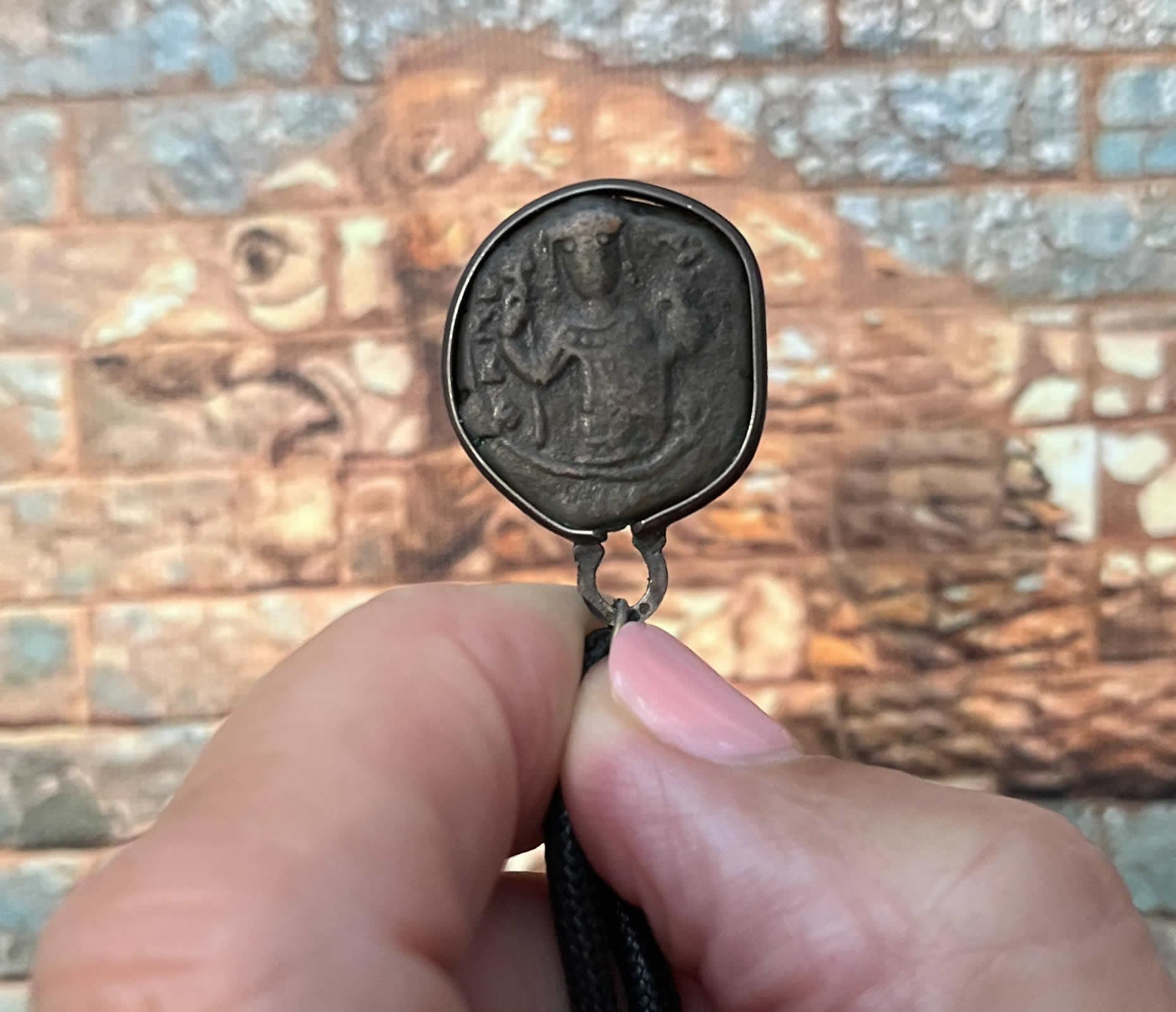 1143 1180 AD Byzantine Emperor Manuel I Komnenos holds cross+ supported by globe left and military standard right Greek Chi Rho X P  for CHRIST OBVERSE bronze coin